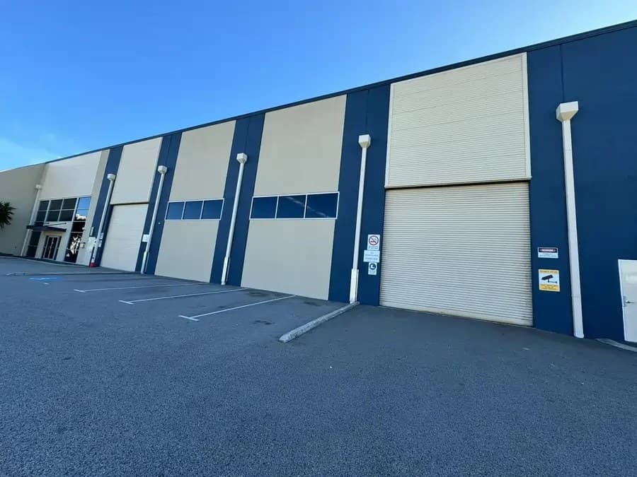 Freshly painted industrial warehouse in cream and navy